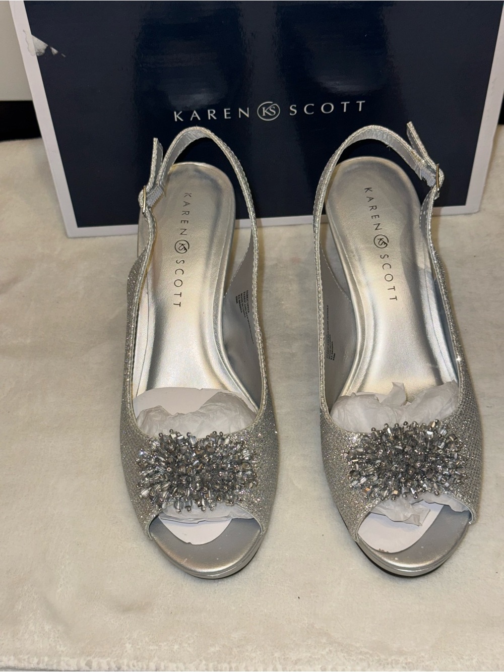 Karen Scott Breena Slingback Peep-Toe Pumps featuring a dazzling crystal brooch